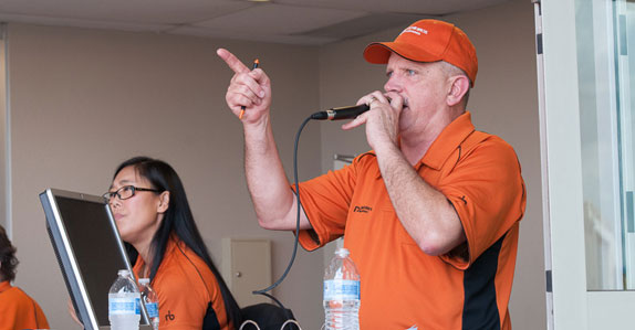 An auctioneer starts the bidding process